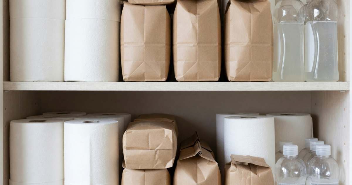 A pantry shelf neatly stocked with repeat household staples, paper towels, coffee bags and dish soap, illustrating Amazon Subscribe and Save in Canada.