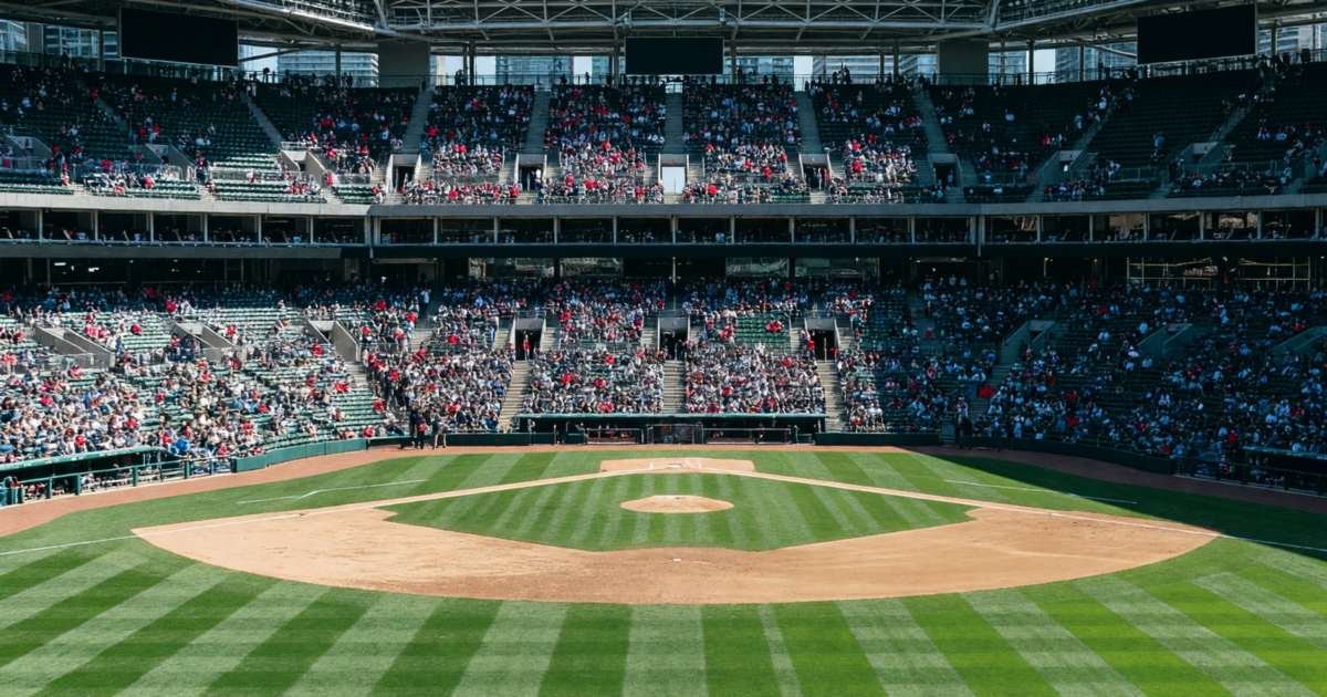 A baseball stadium with an open roof on a sunny afternoon, fans in the upper deck, illustrating cheap Blue Jays tickets in 2027.