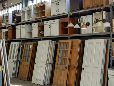 A thrift and reuse store with used doors, cabinets and light fixtures.