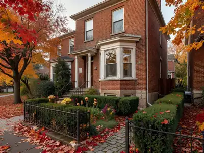 A Victorian semi-detached house with a bay window and a small front garden on a leafy street.